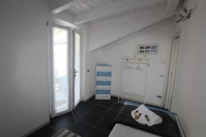 a living room with a couch and a window at APPARTAMENTO STELLA in Lezzeno +63 photos