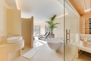 Ein Badezimmer in der Unterkunft R&R Residenzen Aparthotel