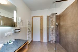 Ein Badezimmer in der Unterkunft R&R Residenzen Aparthotel