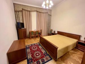 Televízia a/alebo spoločenská miestnosť v ubytovaní Stara Louka Apartments + 9 fotografií