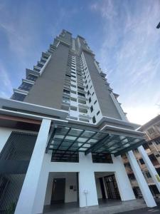a tall building with a lot of balconies on it at MyNest1103A@SweetHome in Melaka