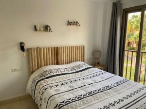 Posteľ alebo postele v izbe v ubytovaní Elegant apartment, stunning views, fully renovated in la Hacienda del Senorio de Cifuentes