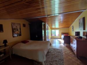 Postel nebo postele na pokoji v ubytování Maison paisible