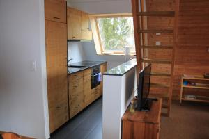 Dapur atau dapur kecil di Haus Gimpel Flumserberg