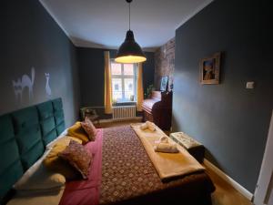 Posteľ alebo postele v izbe v ubytovaní Apartament Koci Łeb