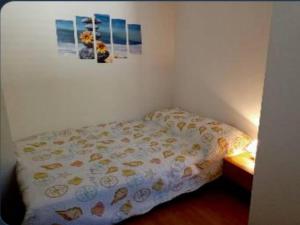 Postel nebo postele na pokoji v ubytování Blaža