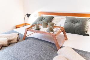 Llit o llits en una habitació de [CANTU-COMO] WiFi, Design & Relax