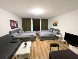 Μια τηλεόραση ή/και κέντρο ψυχαγωγίας στο Wohnung in Troisdorf T03