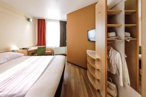 Postel nebo postele na pokoji v ubytování ibis Bamberg Altstadt + 27 fotografií