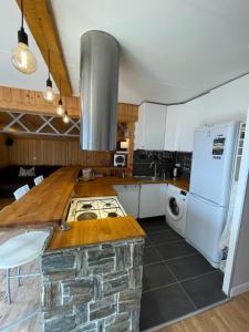 Kuchnia lub aneks kuchenny w obiekcie Agréable appartement de 65m2 vue exceptionnelle