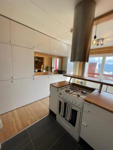 Kuchnia lub aneks kuchenny w obiekcie Agréable appartement de 65m2 vue exceptionnelle