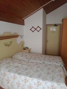 Postel nebo postele na pokoji v ubytování Oberthaler Hotel