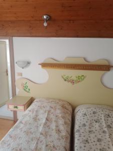 Postel nebo postele na pokoji v ubytování Oberthaler Hotel