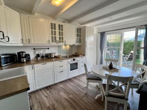 Kuchyň nebo kuchyňský kout v ubytování Ferienhaus-Simone