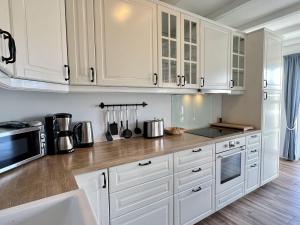 Kuchyň nebo kuchyňský kout v ubytování Ferienhaus-Simone