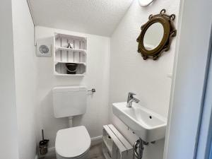 Koupelna v ubytování Ferienhaus-Simone + 12 fotografií