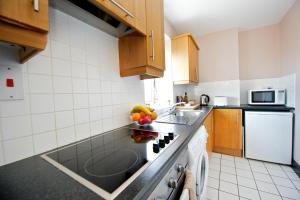 A kitchen or kitchenette at Staycity Aparthotels Millennium Walk