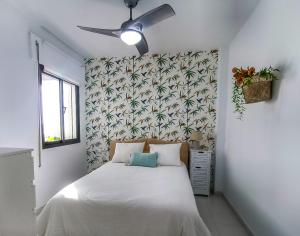 Postel nebo postele na pokoji v ubytování Vistahermosa Palm + 36 fotografií