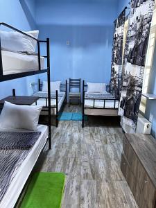 Voodi või voodid majutusasutuse Tbil Home Hostel toas