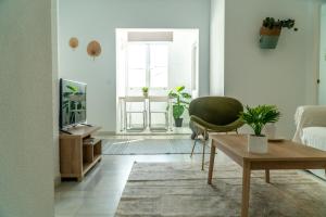 TV a/nebo společenská místnost v ubytování Vistahermosa Palm