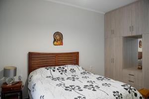 Säng eller sängar i ett rum på Estia