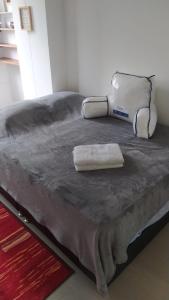 Ein Bett oder Betten in einem Zimmer der Unterkunft International House Co-Living