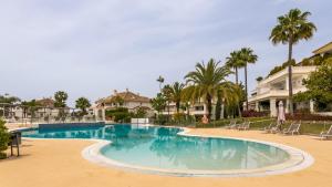 Bazén v ubytovaní Luxury apartment at Monte Paraiso alebo v jeho blízkosti