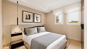 Posteľ alebo postele v izbe v ubytovaní Luxury apartment at Monte Paraiso