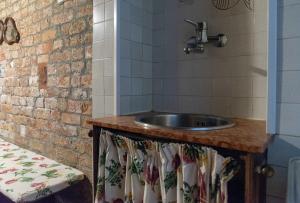 a bathroom with a sink and a counter at Ca' Rielo in Venice