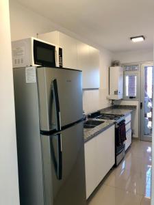Güemes Premium, 2 dorm con Vista a las Sierras ALOHA #2的厨房或小厨房
