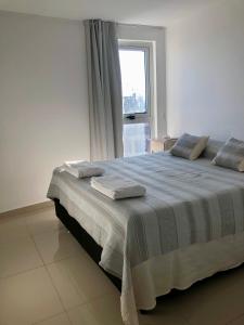 Güemes Premium, 2 dorm con Vista a las Sierras ALOHA #2客房内的一张或多张床位