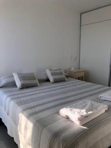 Güemes Premium, 2 dorm con Vista a las Sierras ALOHA #2客房内的一张或多张床位