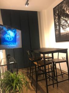TV a/nebo společenská místnost v ubytování IL TIGLIO VERDE
