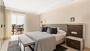 Posteľ alebo postele v izbe v ubytovaní Luxury apartment at Monte Paraiso