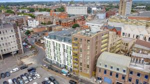 an aerial view of a city with buildings at SPACIOUS, BRIGHT & Modern 1 & 2 bed Apartments at Sligo House - CENTRAL Watford in Watford