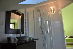 a bathroom with a shower and a sink and a mirror at La Villa Antalya in Ault +37 photos