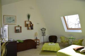 a living room with a couch and a table at La Villa Antalya in Ault