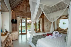 Katil atau katil-katil dalam bilik di Amaya Sebatu Villa