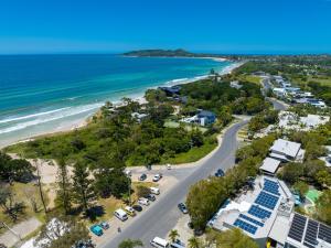 an aerial view of the beach and the ocean at Swell Byron Bay - Opposite the Belongil Beach in Byron Bay