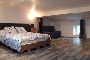 Posteľ alebo postele v izbe v ubytovaní Gîte avec Piscine Proche de Carcassonne