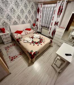 Tempat tidur dalam kamar di Dom Wypoczynkowy Trzy Sroczki