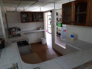 a view of a kitchen with a counter top at Gia's Garage & Home for Bocas travelers in Almirante