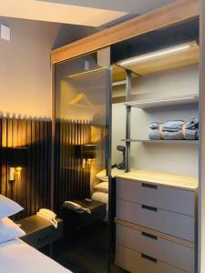Postel nebo postele na pokoji v ubytování EXCLUSIVO APARTAESTUDIO USAQUEN + 41 fotografií