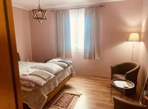 Postel nebo postele na pokoji v ubytování Vila Vanilla