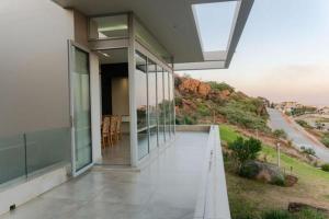 a balcony of a house with a view of a road at Kawo 800 House in Johannesburg