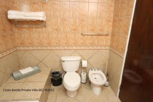 a bathroom with a toilet and a bidet at Costa Bonita Private Villa 602 in Culebra