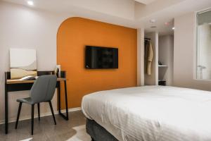 TV a/nebo společenská místnost v ubytování Giant Rich Hotel