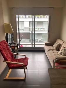 Zona de estar de Moderno Loft en Termas del Daymán