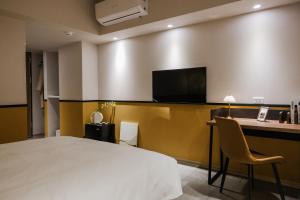 TV a/nebo společenská místnost v ubytování Giant Rich Hotel