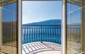 a view of the ocean from a balcony at Apartment Baosici Baosici in Herceg-Novi